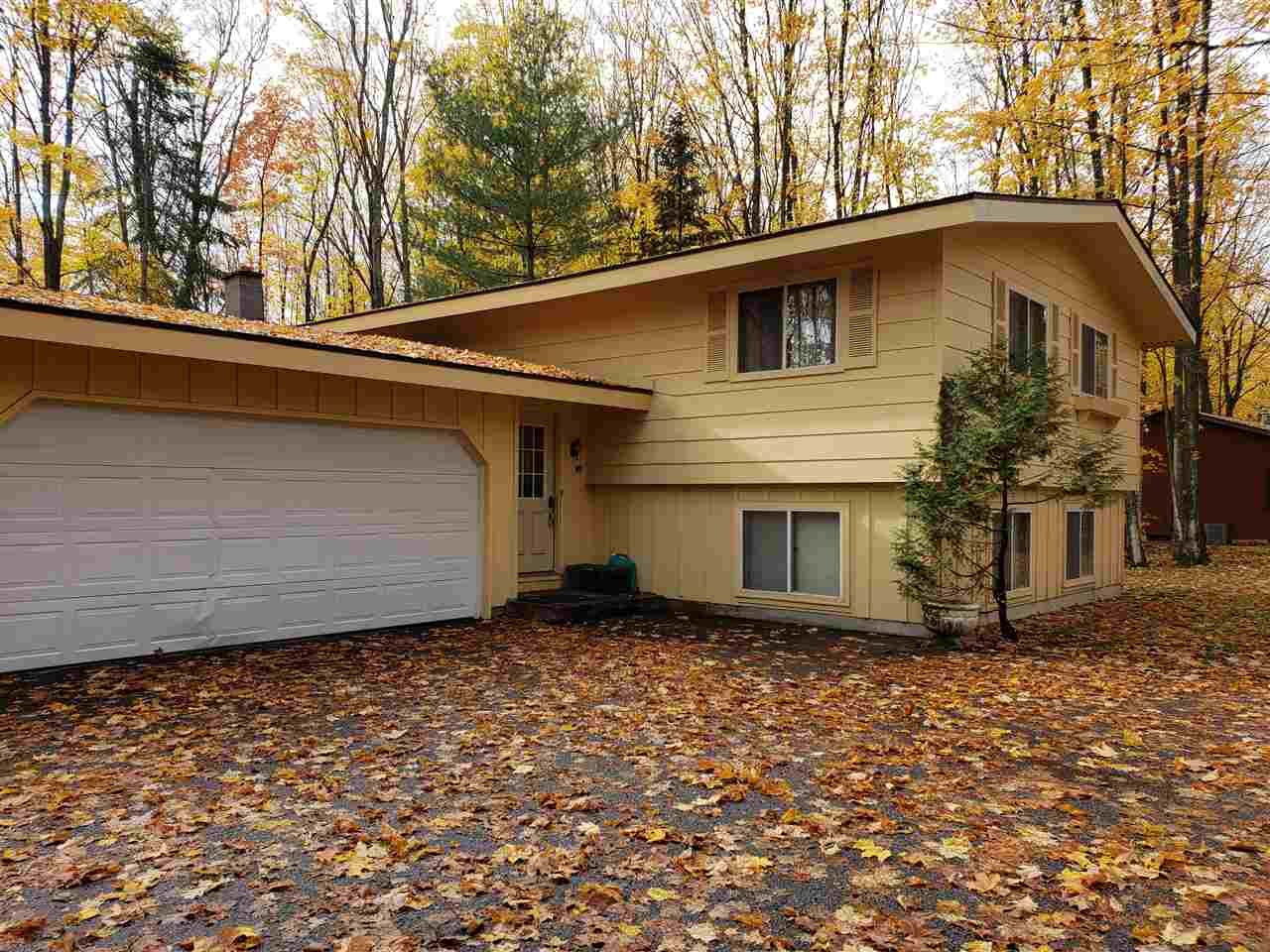 Property Photo:  850 Woodview  MI 49740 