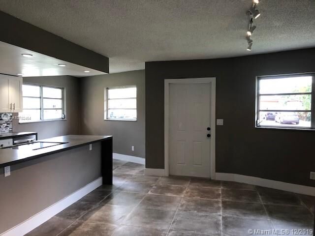 Property Photo:  11940 NE 12th Ct 2  FL 33161 