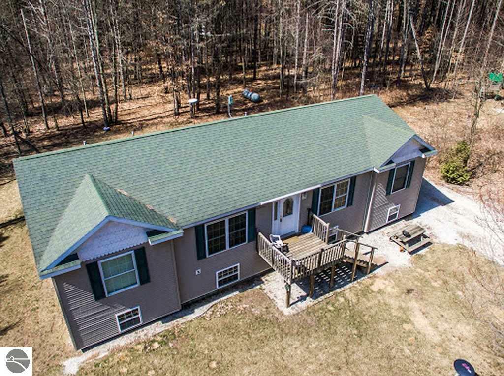 Property Photo:  424 SE County Line Road  MI 48889 