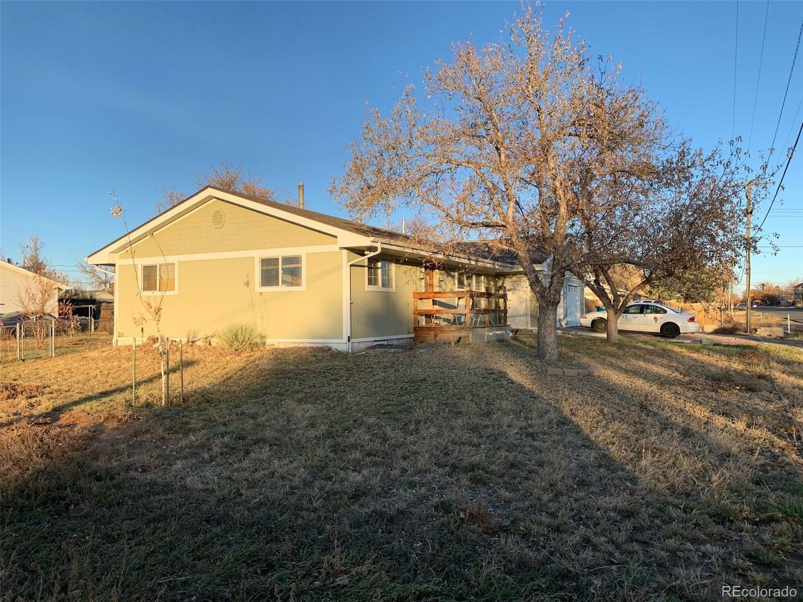 Property Photo: 18641 E 19th Avenue CO 80011