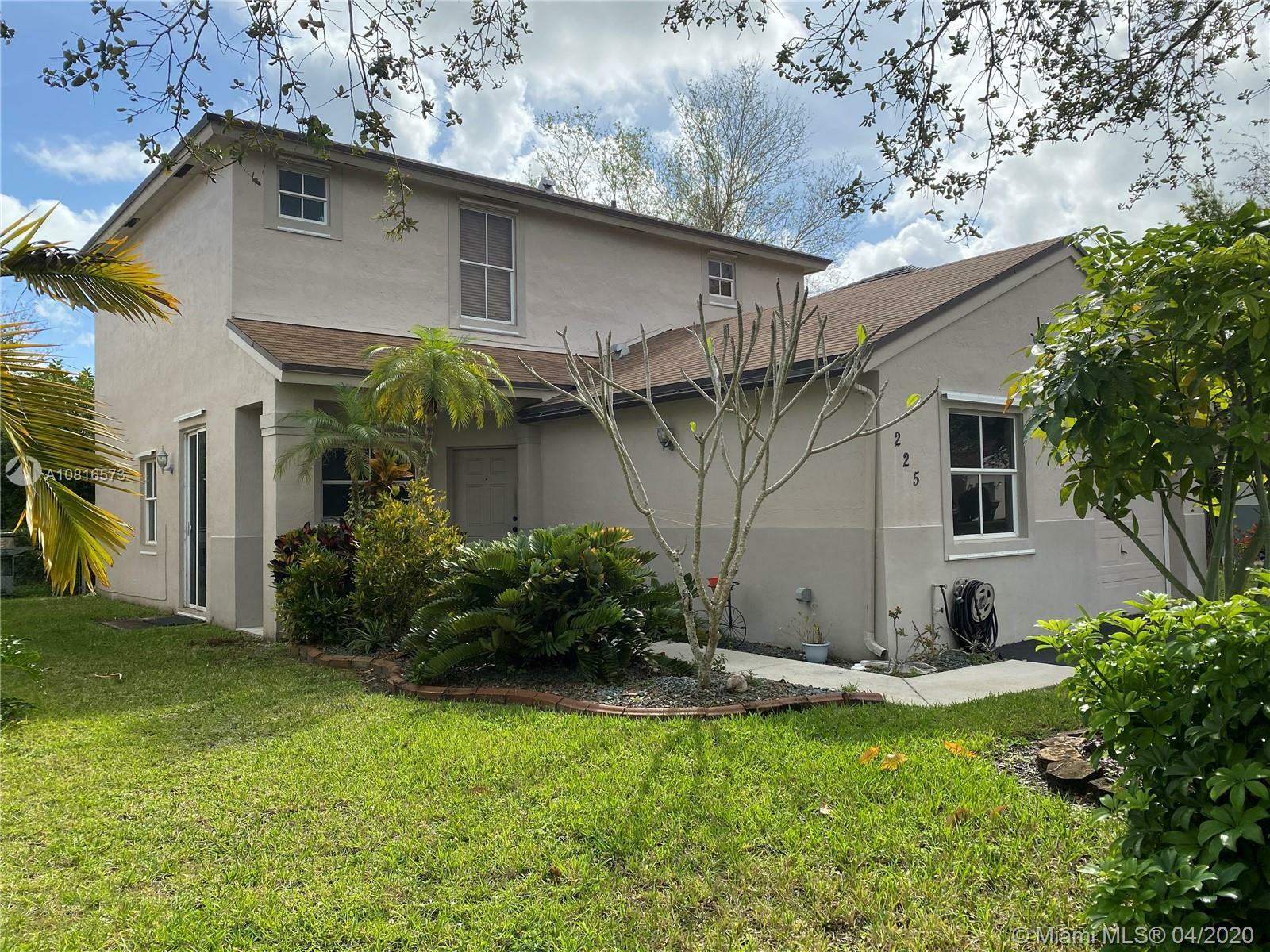 Property Photo:  225 NW 207th Ter  FL 33029 