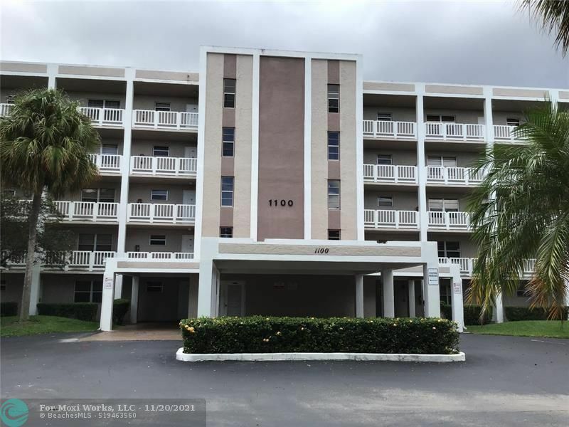 Property Photo:  1100 NW 87th Ave 202  FL 33071 