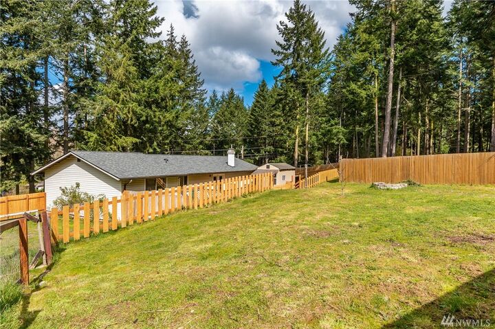 Property Photo: 4550 Woodland Circle WA 98277