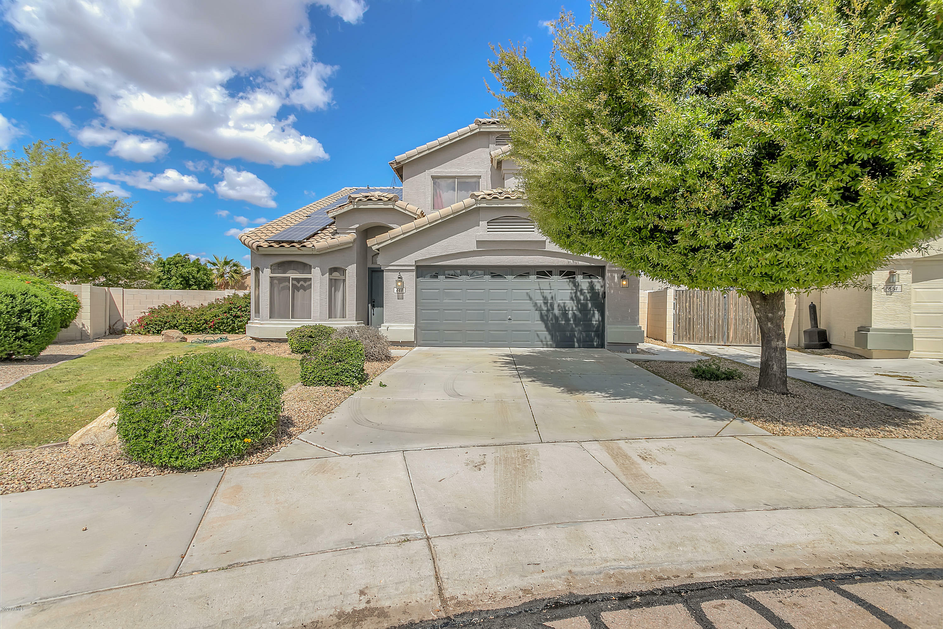 Property Photo:  648 N 167th Drive  AZ 85338 