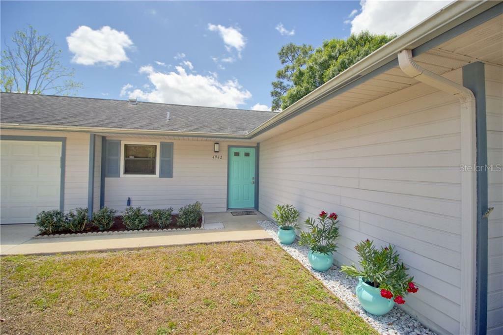 Property Photo:  4942 Reginald Road  FL 32829 