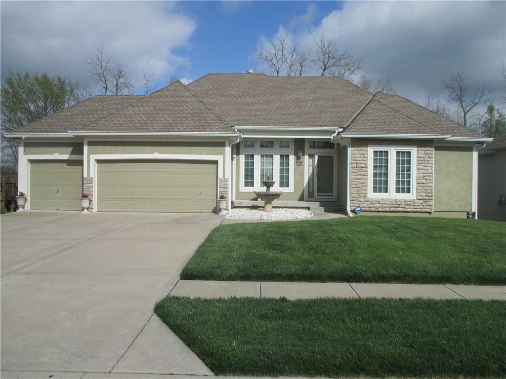 Property Photo:  1213 SW Summit Crossing Drive  MO 64081 