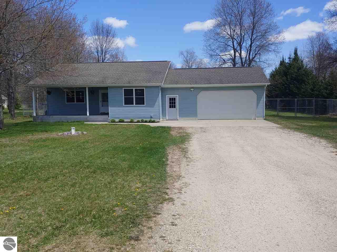 Property Photo:  3633 Driftwood Drive  MI 49601 
