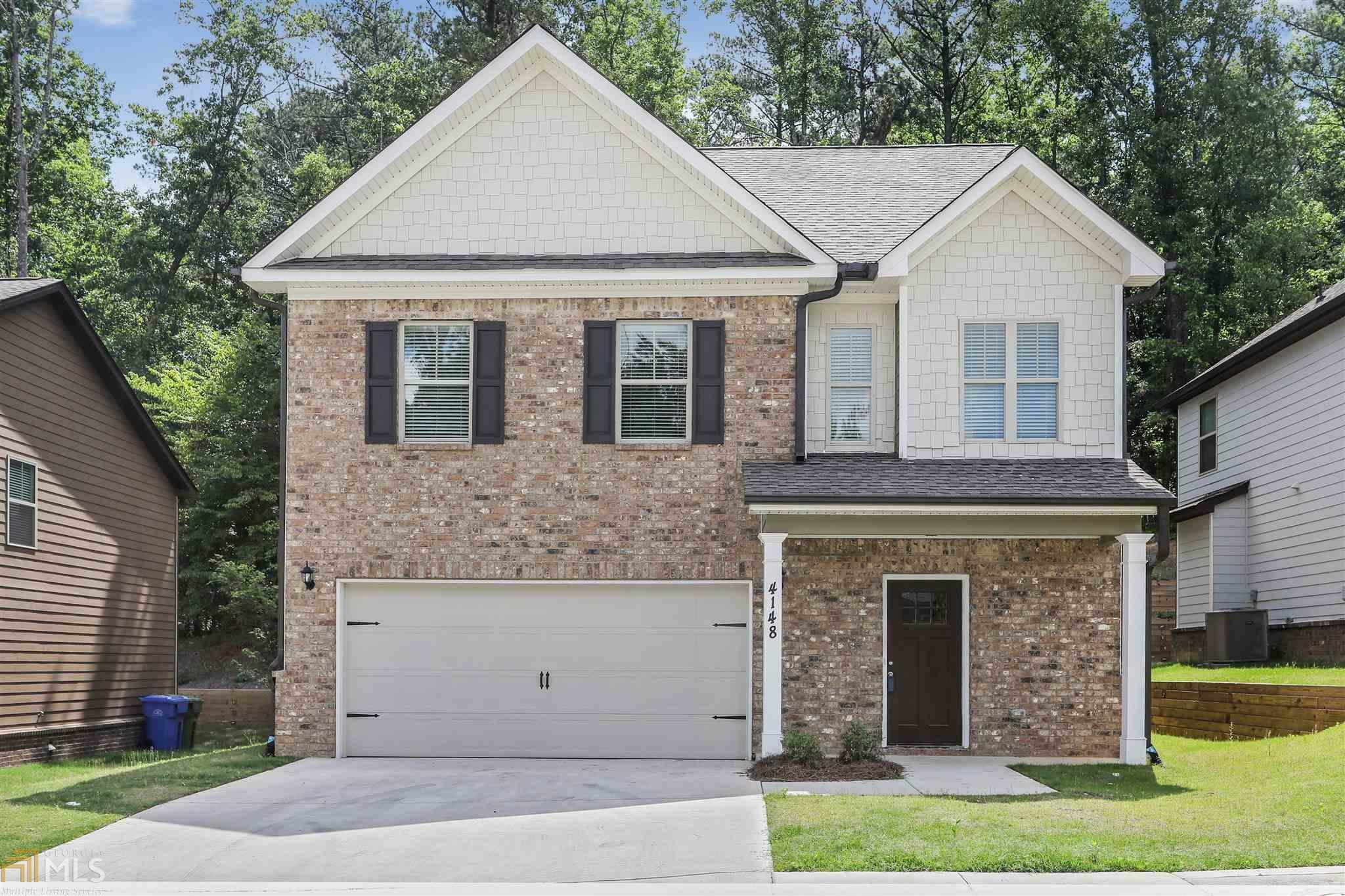 Property Photo: 4148 Woodland Park Drive SW 4 GA 30331