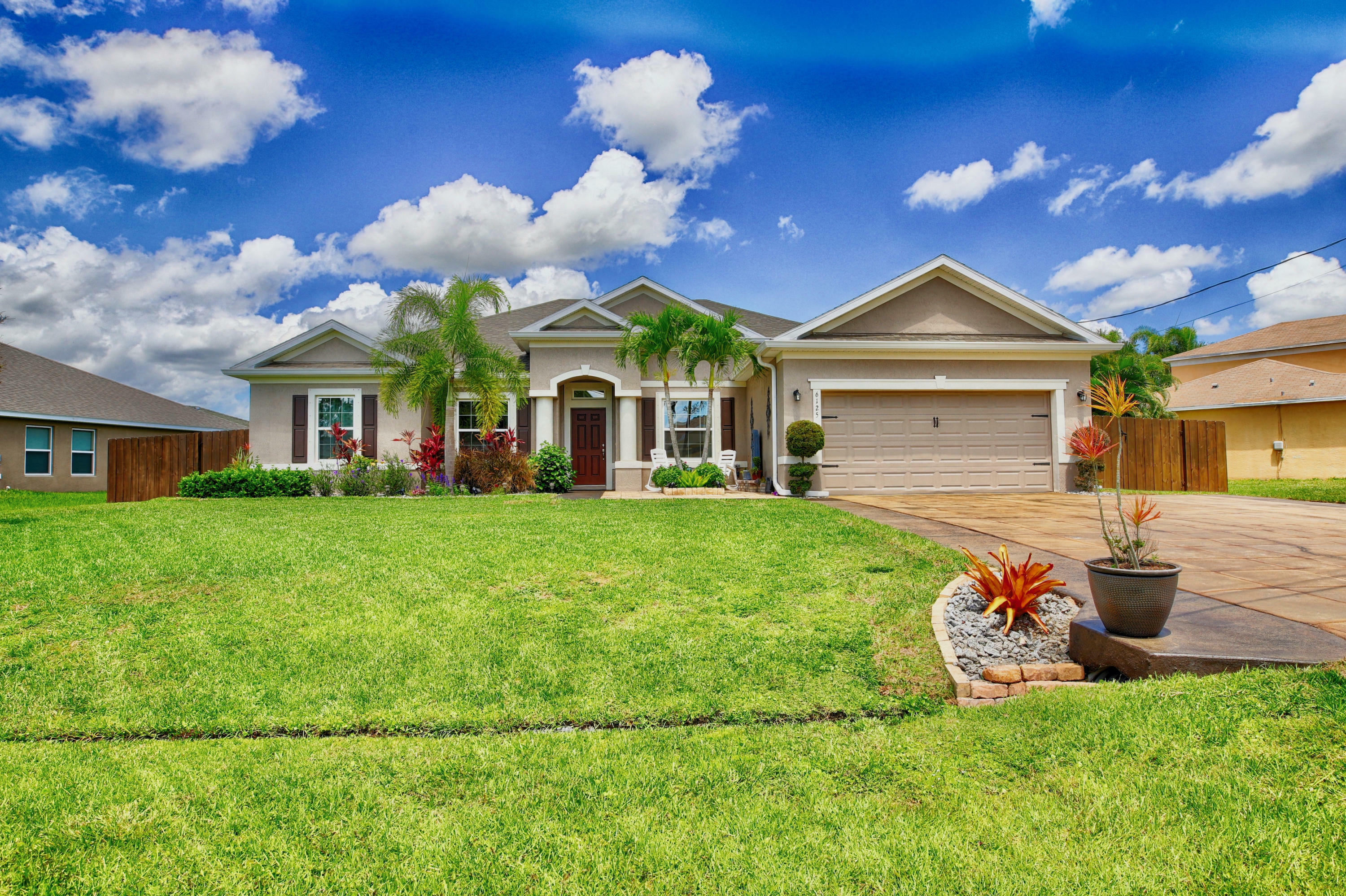 Property Photo:  6125 NW Durian Street  FL 34986 