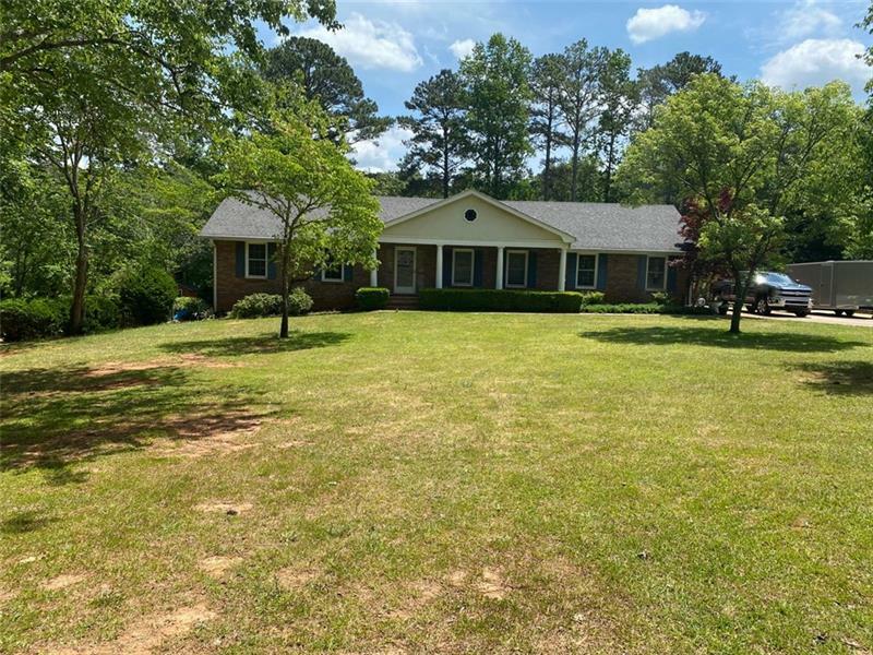 Property Photo:  100 Forest Lake Drive  GA 30016 