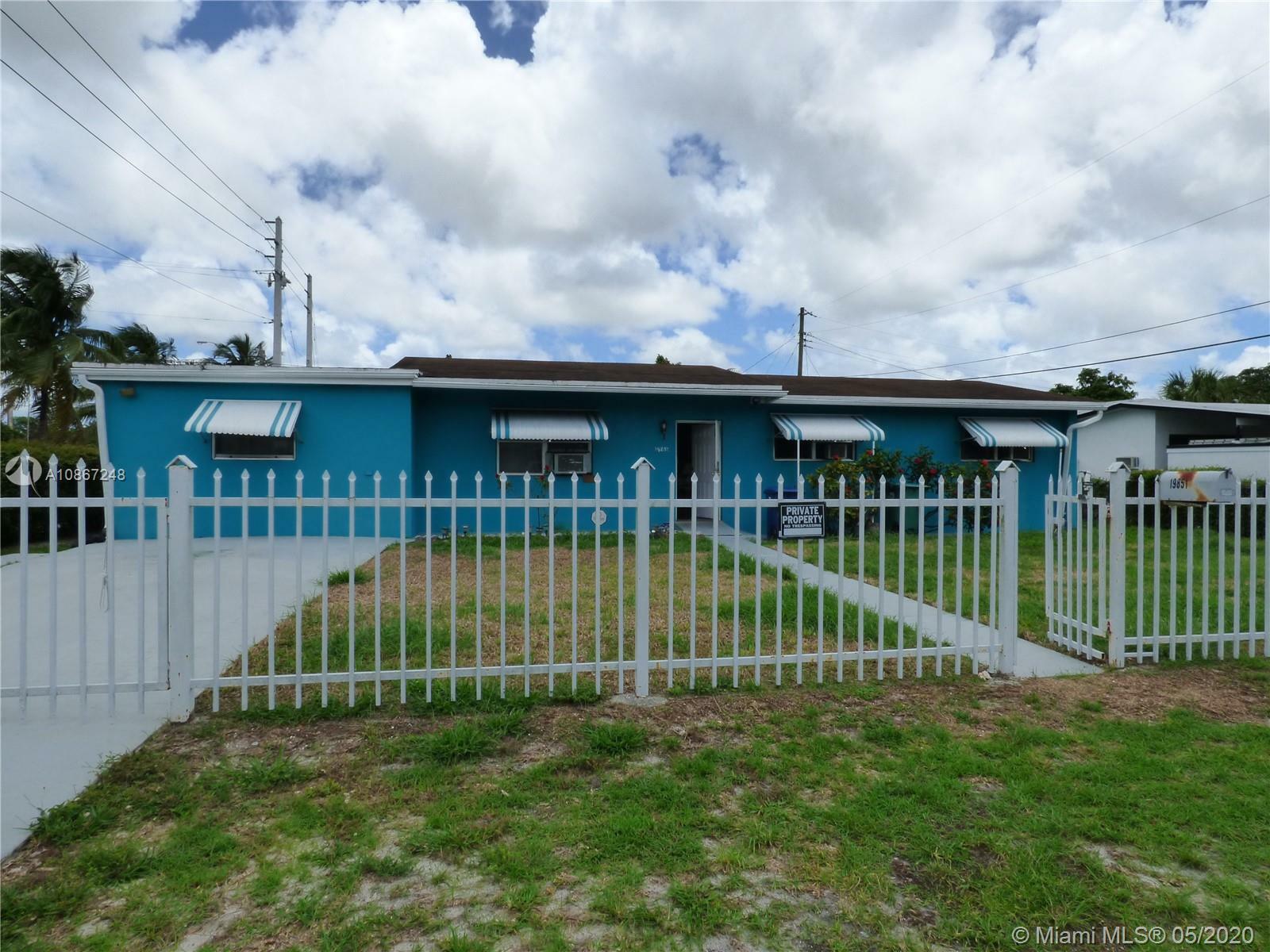 Property Photo:  19851 NW Miami Ct  FL 33169 