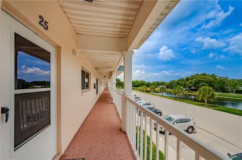 Property Photo:  2291 Americus Boulevard W 25  FL 33763 