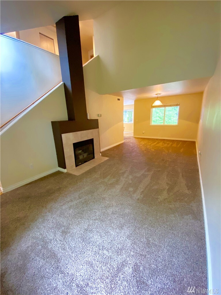 Property Photo: 12950 Granite Lane NW 104 WA 98383