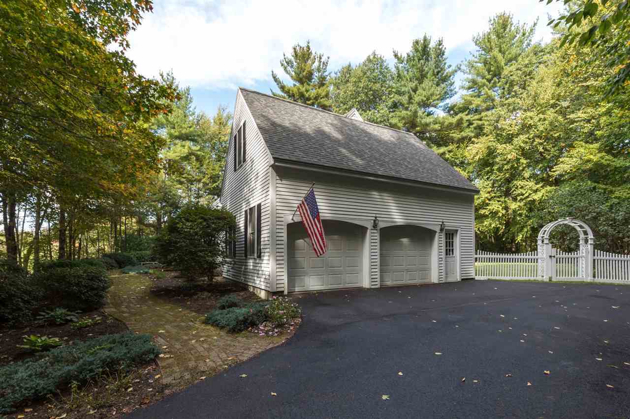 Property Photo: 26 Winding Brook Drive NH 03885