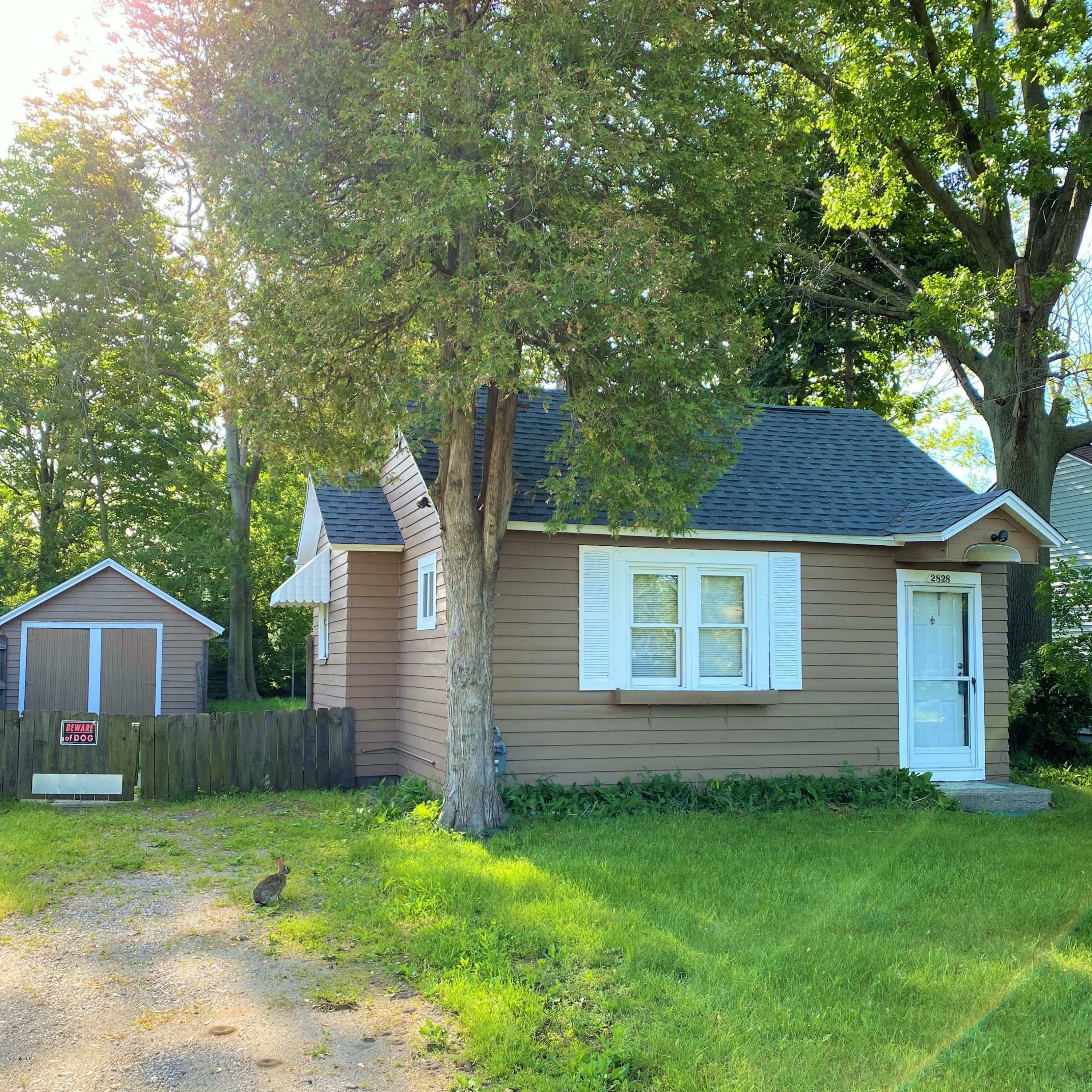 Property Photo:  2828 Sheffield Street  MI 49441 