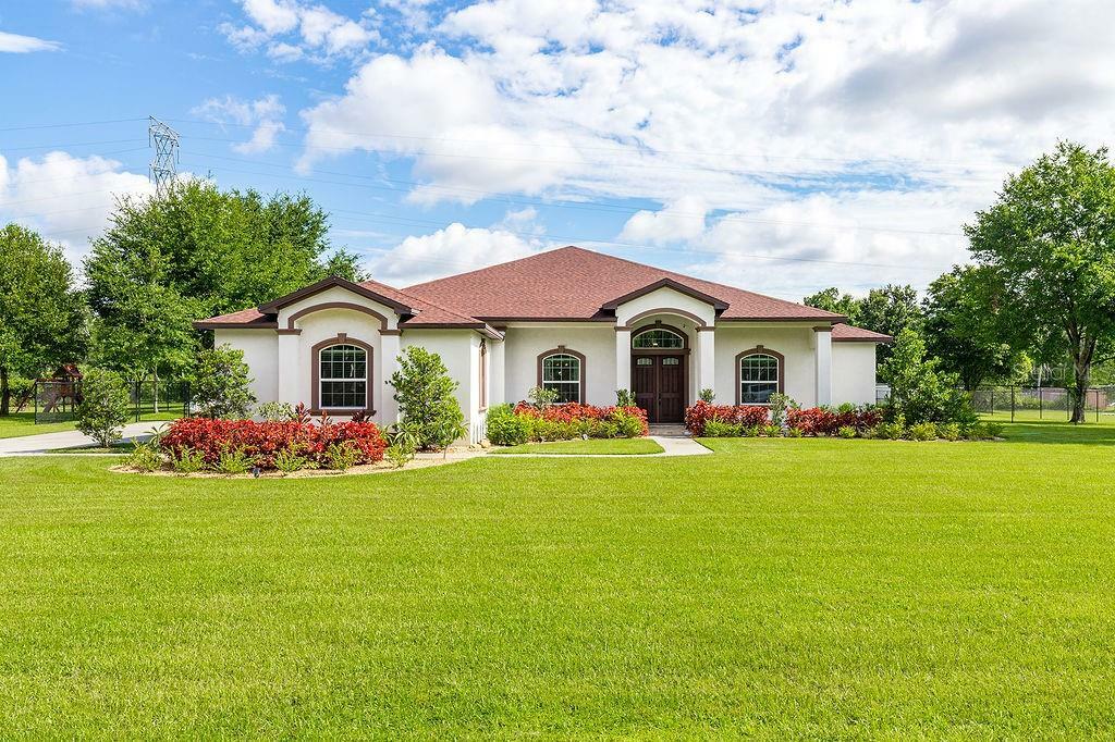 Property Photo:  1702 Green Meadow Drive  FL 33549 