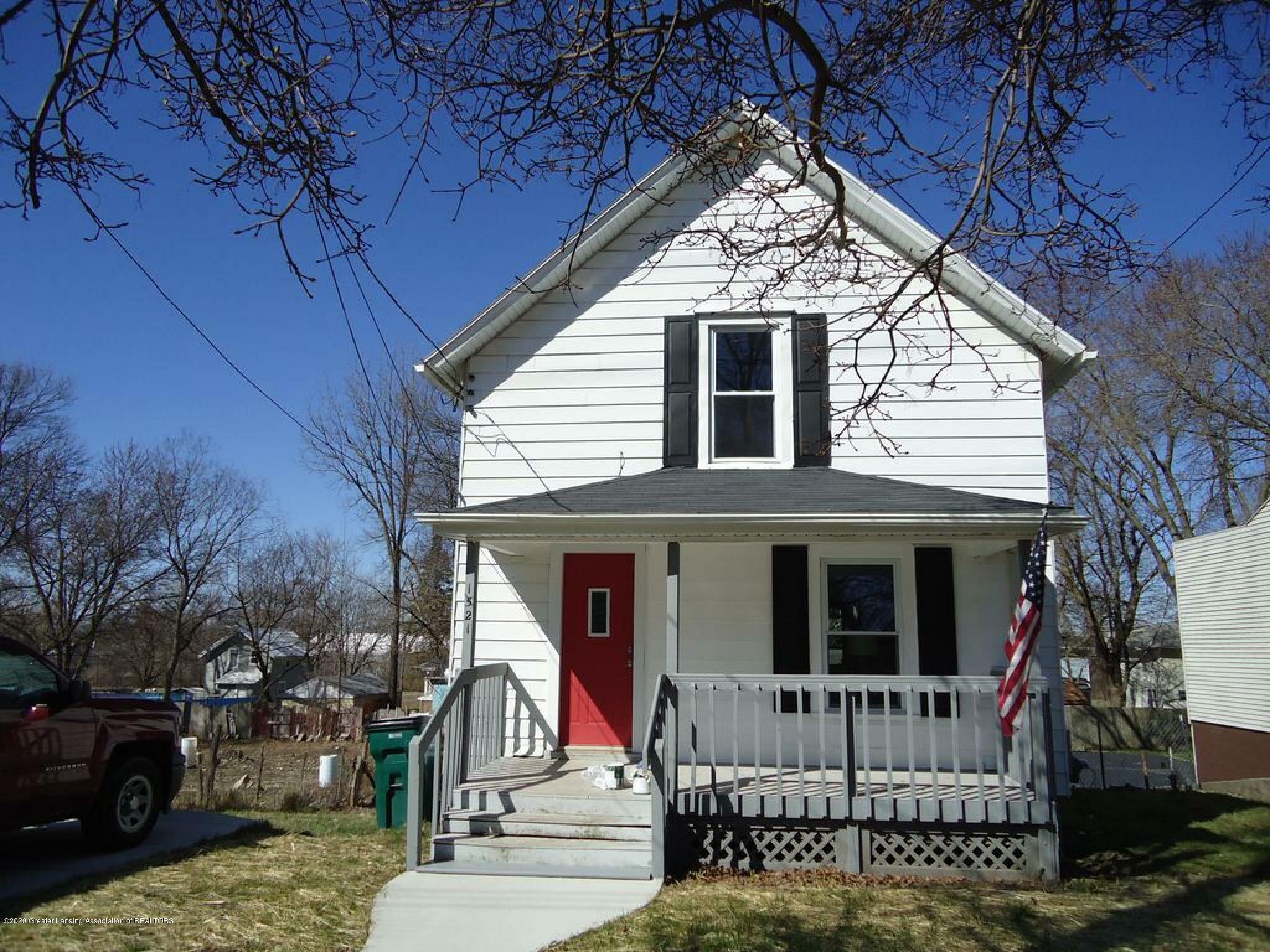 Property Photo:  1521 N High Street  MI 48906 