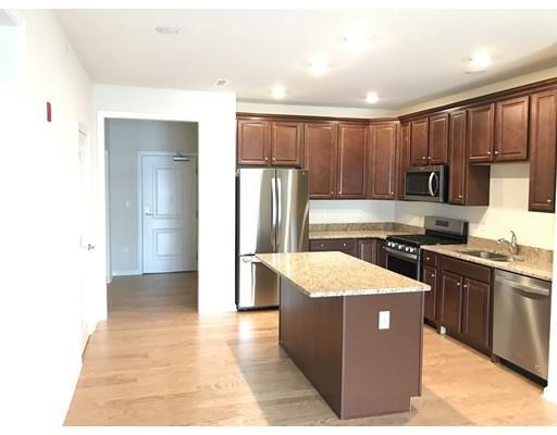Property Photo: 130 University Ave 1404 MA 02090