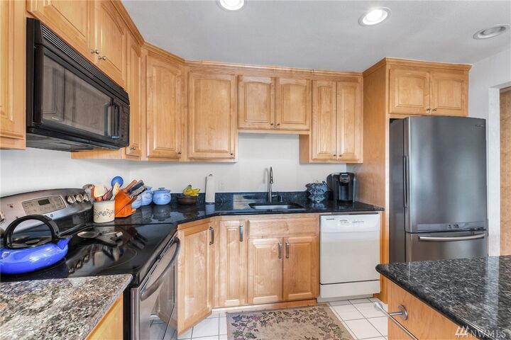 Property Photo: 601 S 227th Street 205S WA 98198