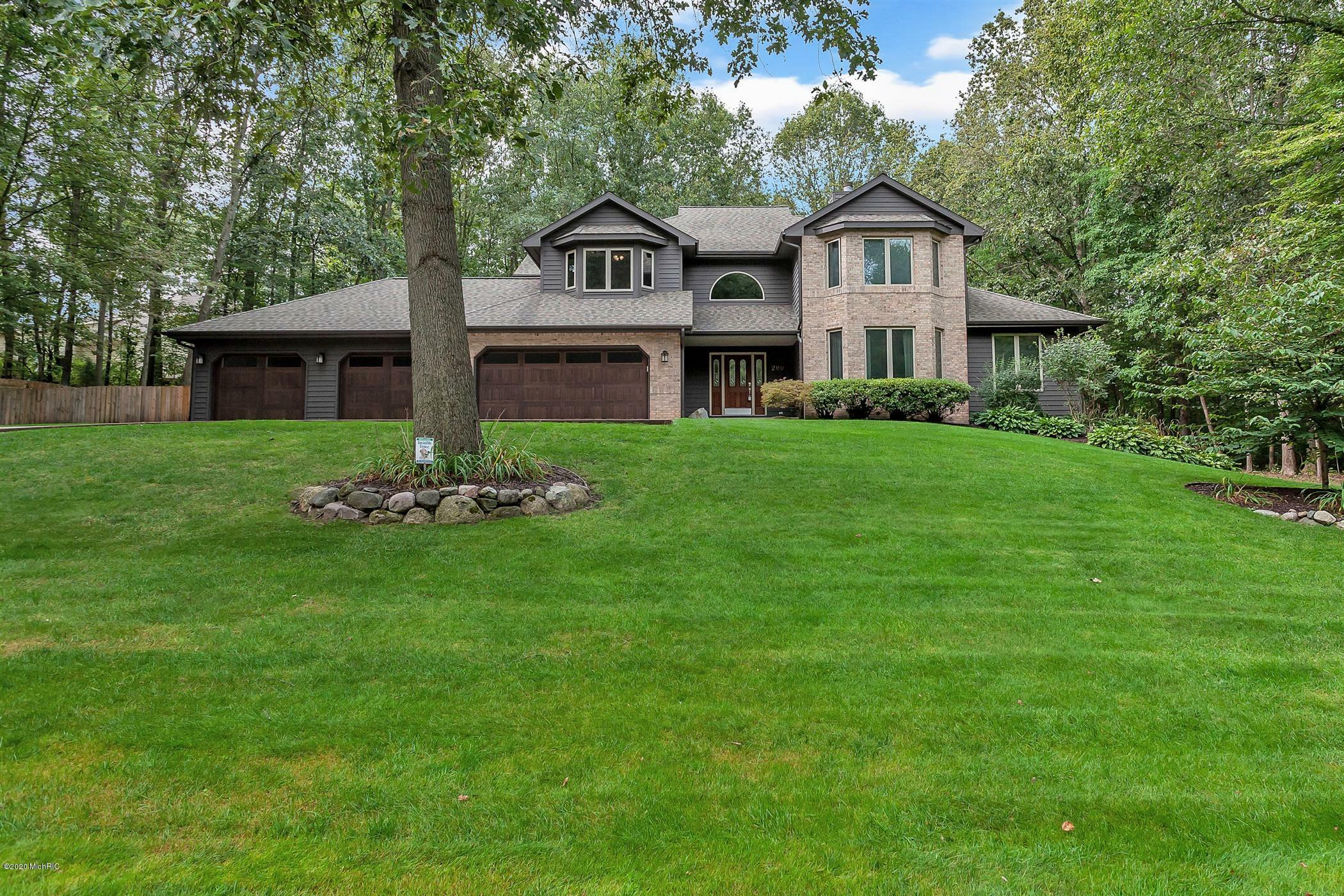 Property Photo:  209 Summerset Drive  MI 49009 