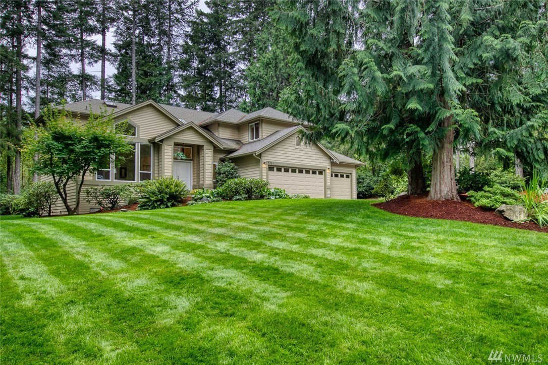 Property Photo:  6381 NW Paddington Ct  WA 98383 