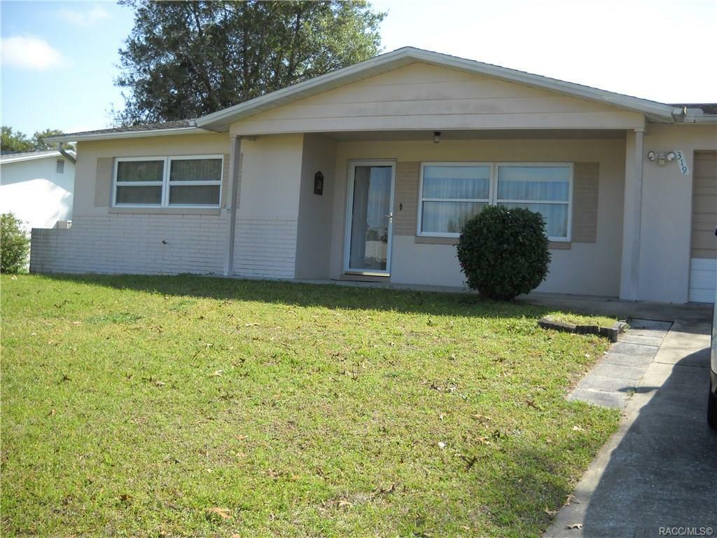 Property Photo:  319 S Adams Street  FL 34465 