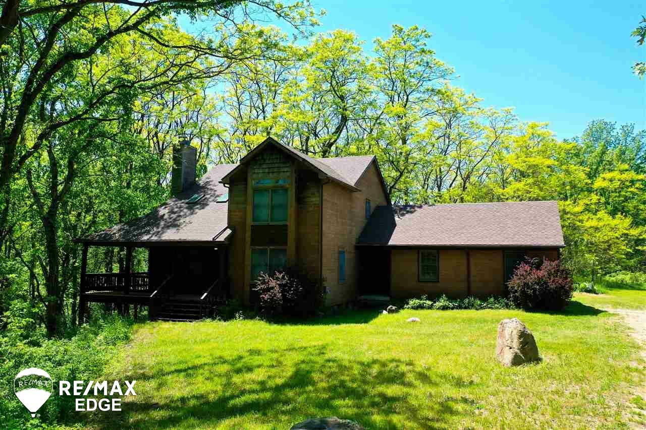 Property Photo:  502 Rustic Hills Rd  MI 48442 