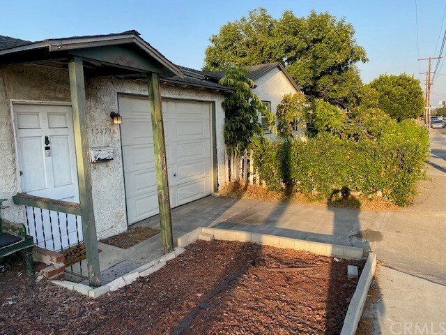 Property Photo:  13471 Ranchero  CA 92843 