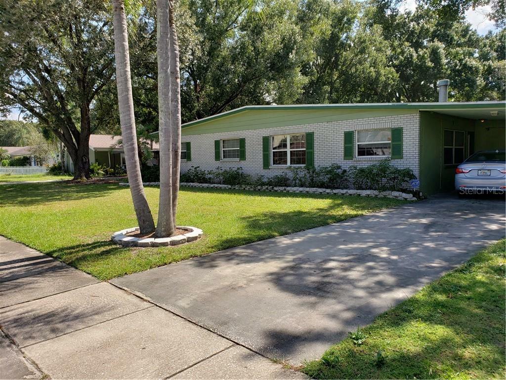 Property Photo:  6611 Travis Boulevard  FL 33610 