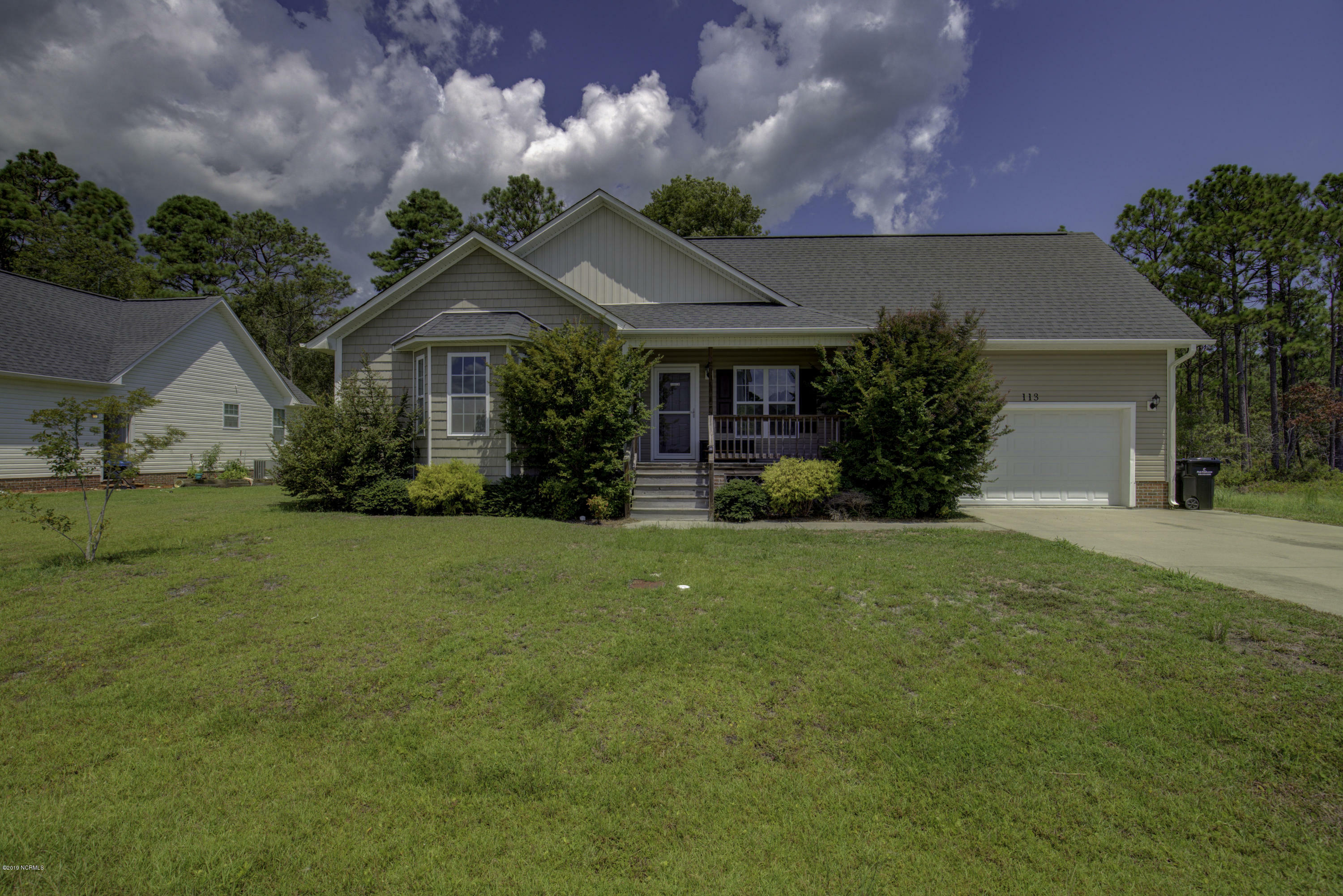 Property Photo:  113 Sages Ridge Drive  NC 28445 
