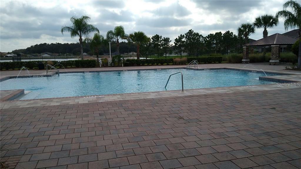 Property Photo:  1232 Sawgrass Pointe Drive  FL 32824 