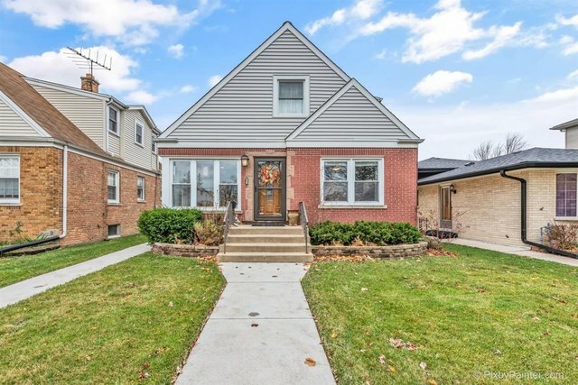 Property Photo:  2304 N 77th Avenue  IL 60707 