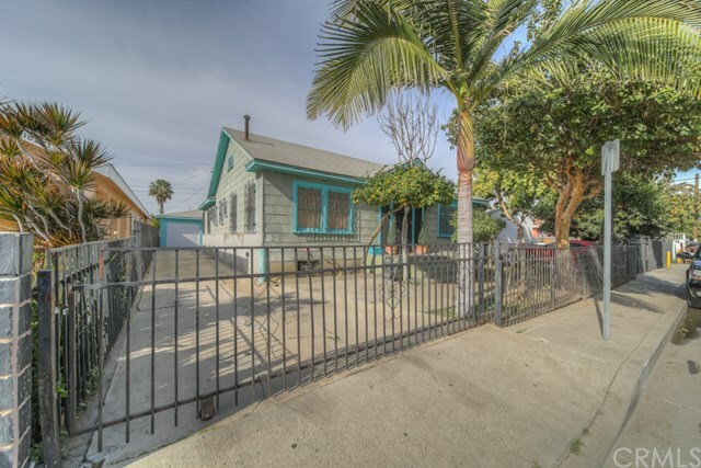 Property Photo:  10819 Mona Boulevard  CA 90059 