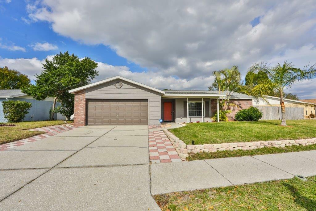 Property Photo:  11216 Fiddlewood Drive  FL 33579 