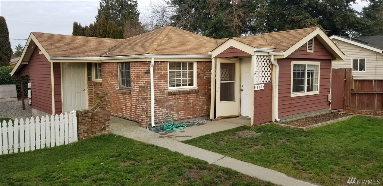 Property Photo: 313 S 65th St WA 98408