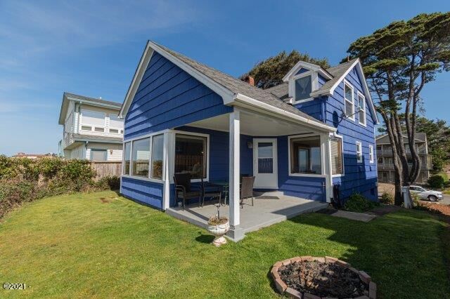 Property Photo:  4567 SW Beach Avenue  OR 97367 