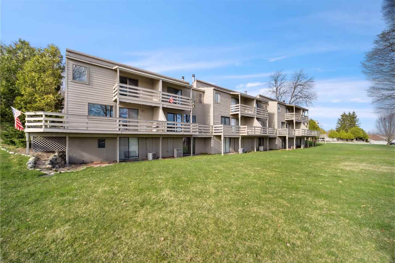 Property Photo:  1185 Hideaway Valley Unit # 23  MI 49740 