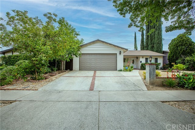 Property Photo:  23920 Hartland Street  CA 91307 