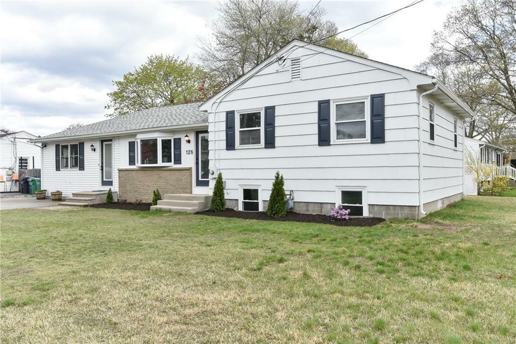 Property Photo:  128 Carnation Dr  RI 02886 