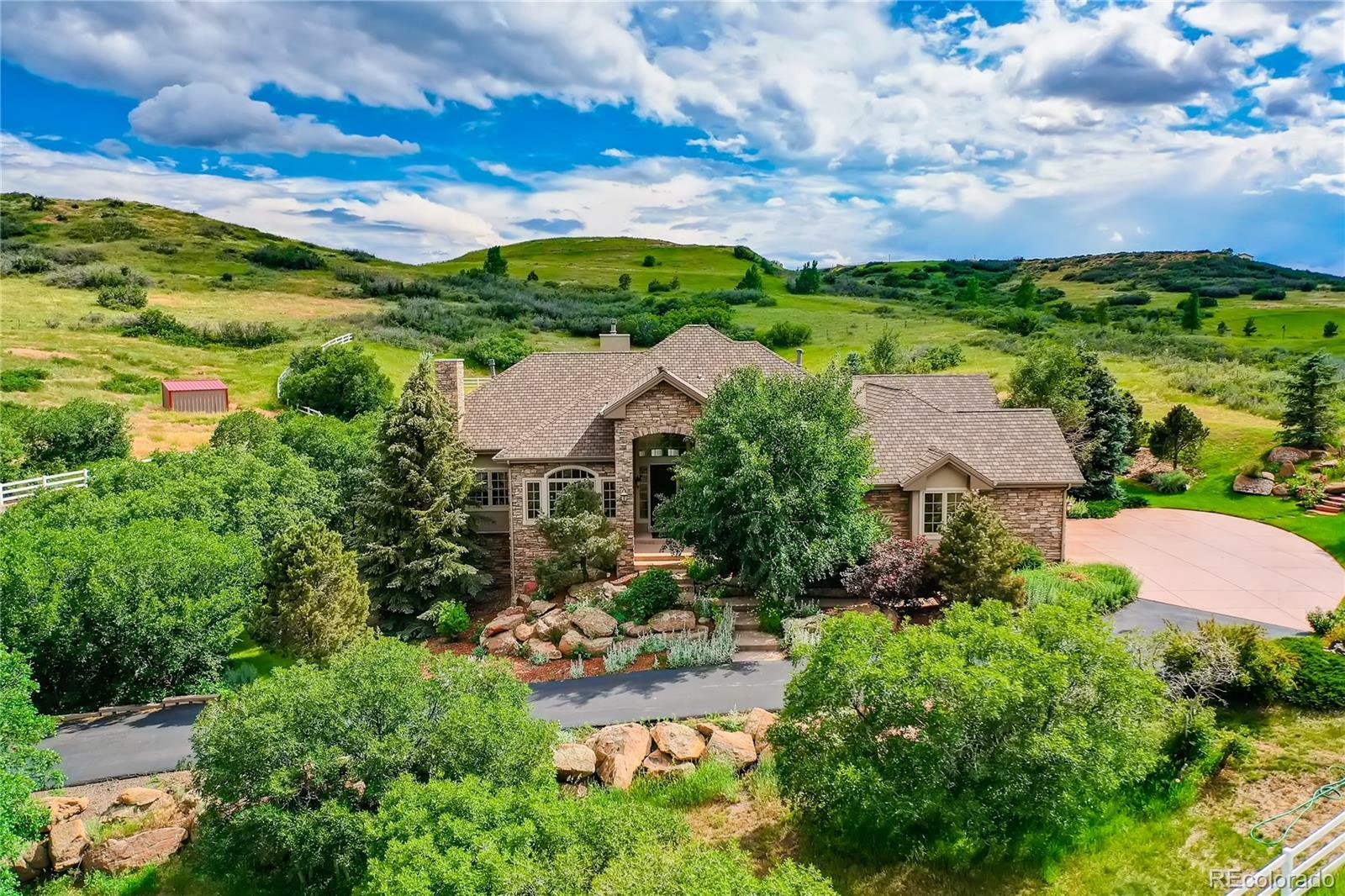 Property Photo:  6130 Crowfoot Valley Road  CO 80134 
