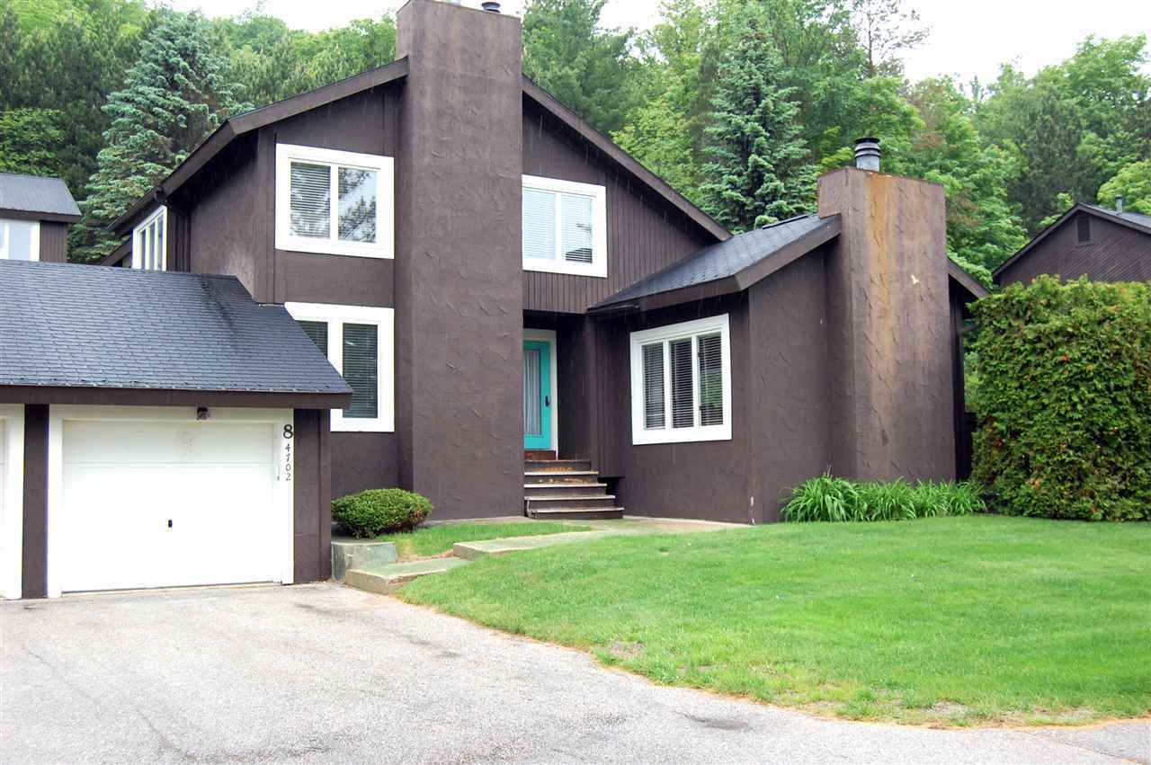 Property Photo: 4702 Camelot Unit 8 MI 49740