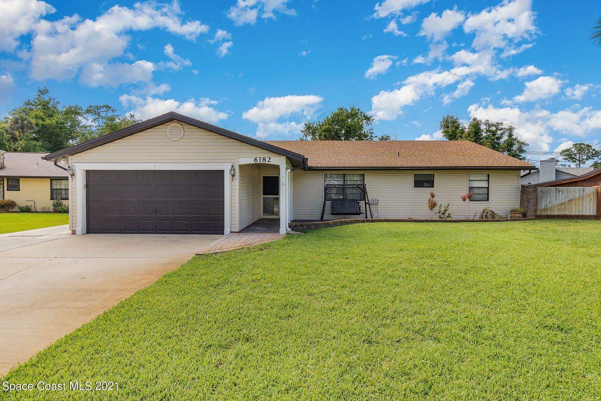 Property Photo:  6182 Sunflower Drive  FL 32927 