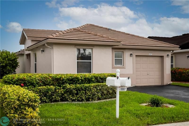 Property Photo:  6967 NW 69th Ct  FL 33321 