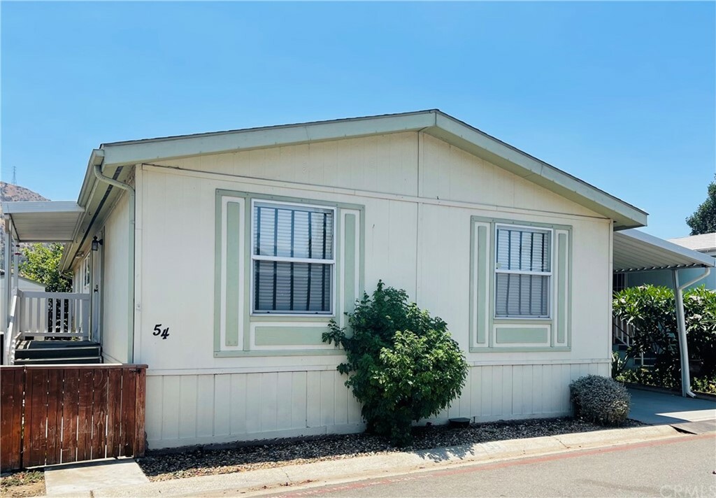 Property Photo:  4901 Green River Road 54  CA 92878 