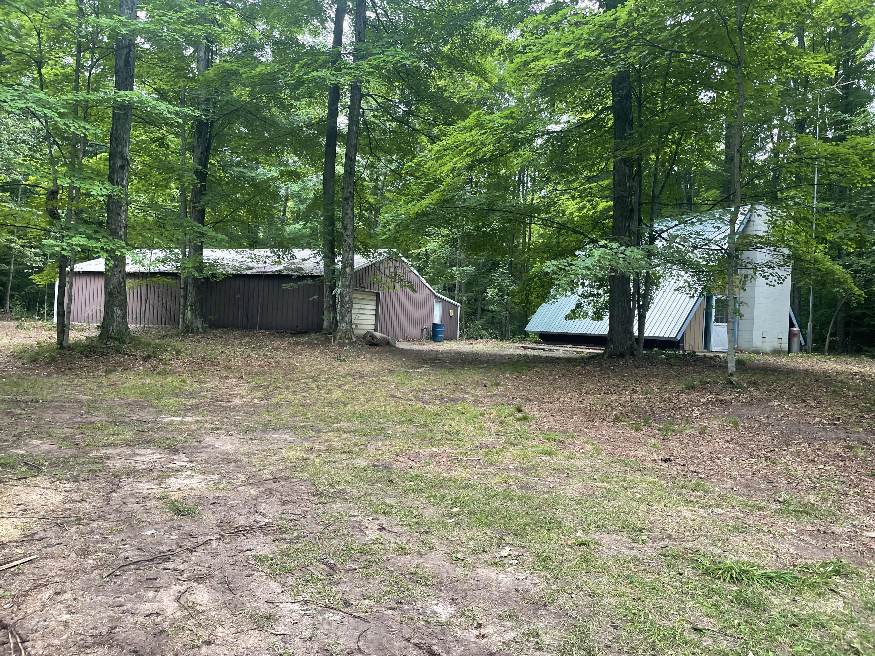 Property Photo:  23837 15 Mile Road  MI 49655 