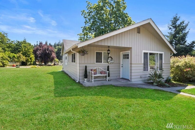 Property Photo:  8107 Vickery Ave E  WA 98443 