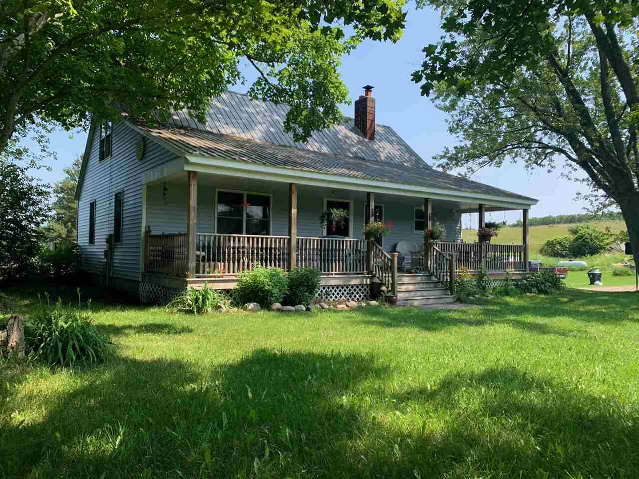 Property Photo:  9301 Ellsworth  MI 49727 