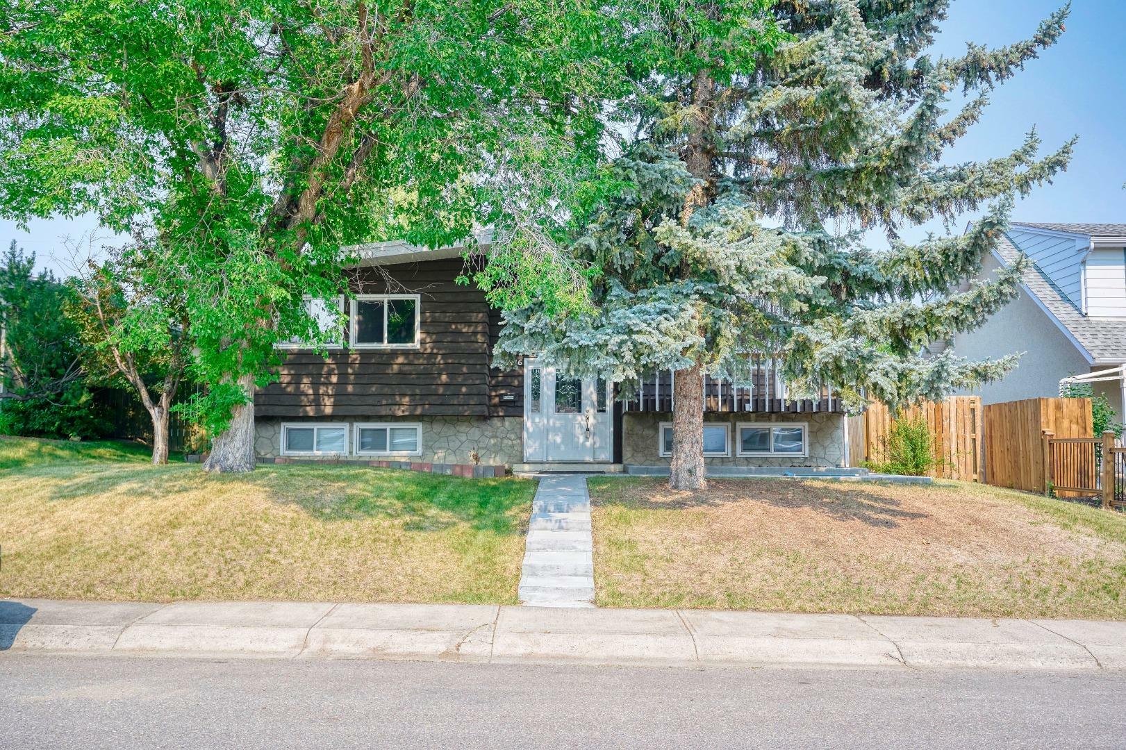 Property Photo: 7416 Hunterfield Road NW AB T2K 4L1