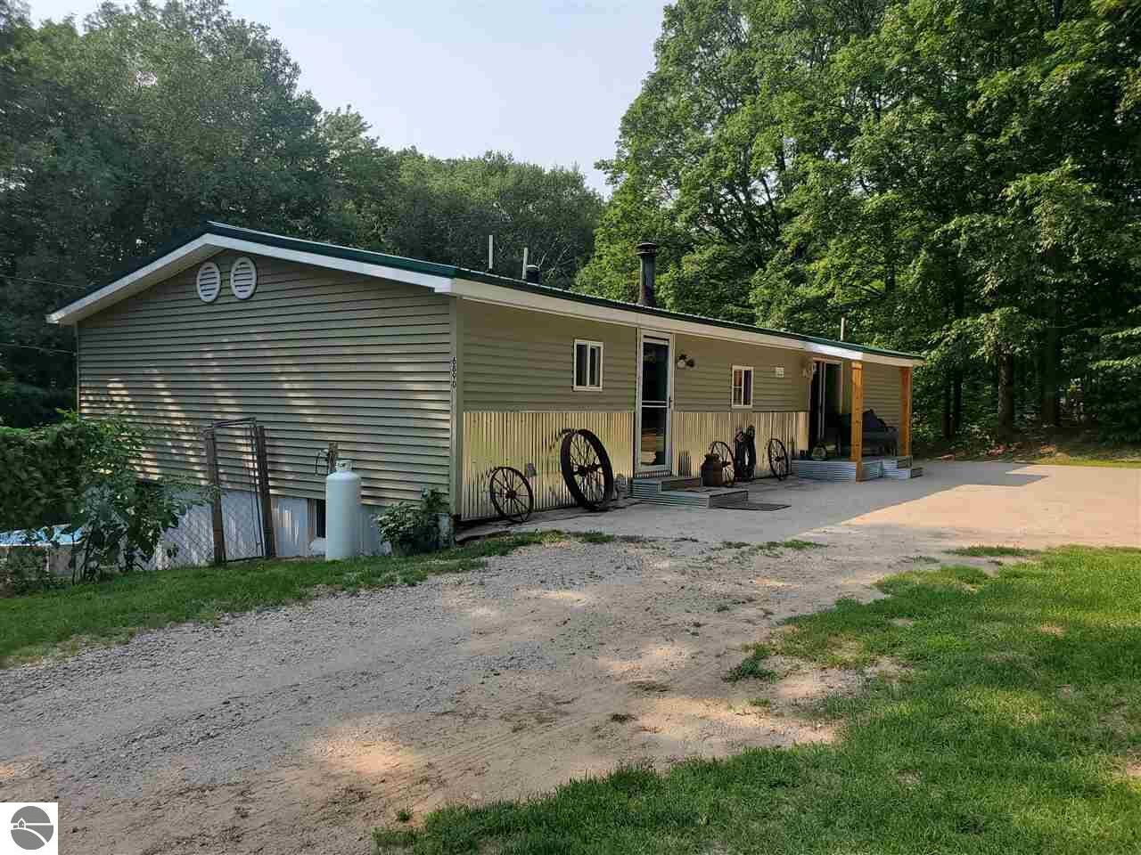 Property Photo:  6890 W 20 Road  MI 49668 