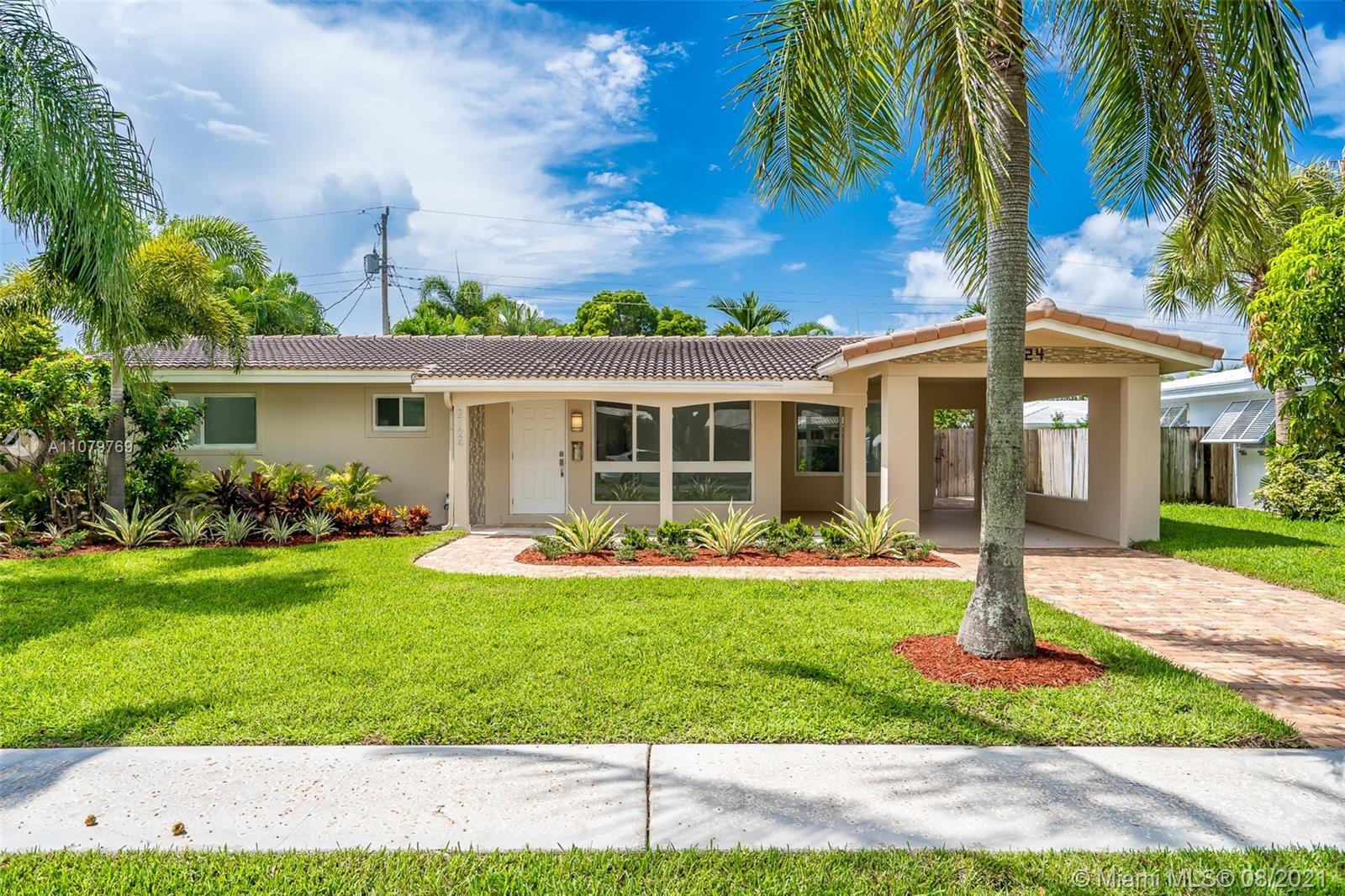 Property Photo: 2124 NE 63rd Ct FL 33308